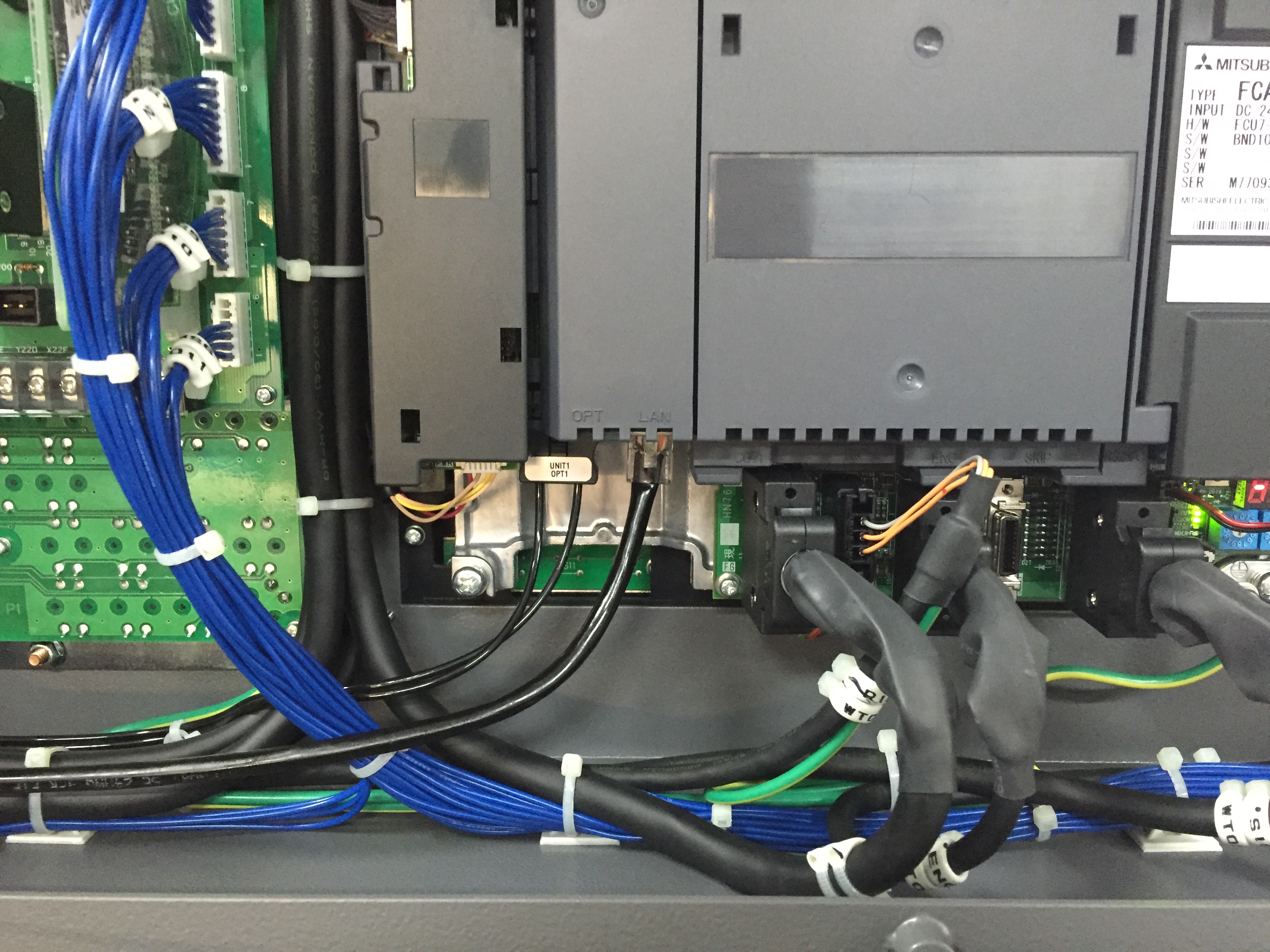 Citizen Cincom L20A — Mitsubishi NCU board with LAN port labeled (OPT/LAN slot)
